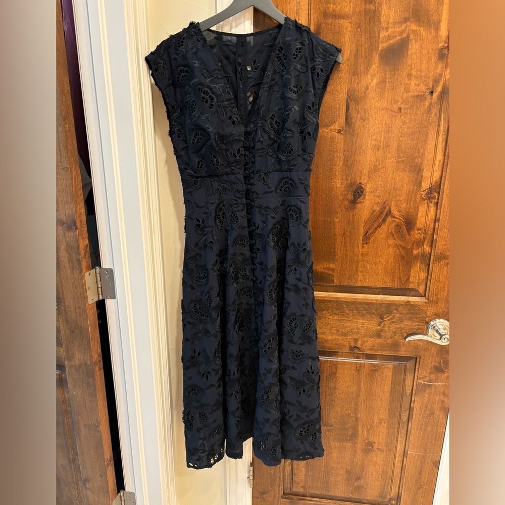 Gorgeous Embroidered Navy V-neck midi Dress. Perfect for any semi-formal event.